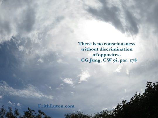 Opis: There is no consciousness without discrimination of opposites. � quote from Carl Jung, against photo of a cloudy sky